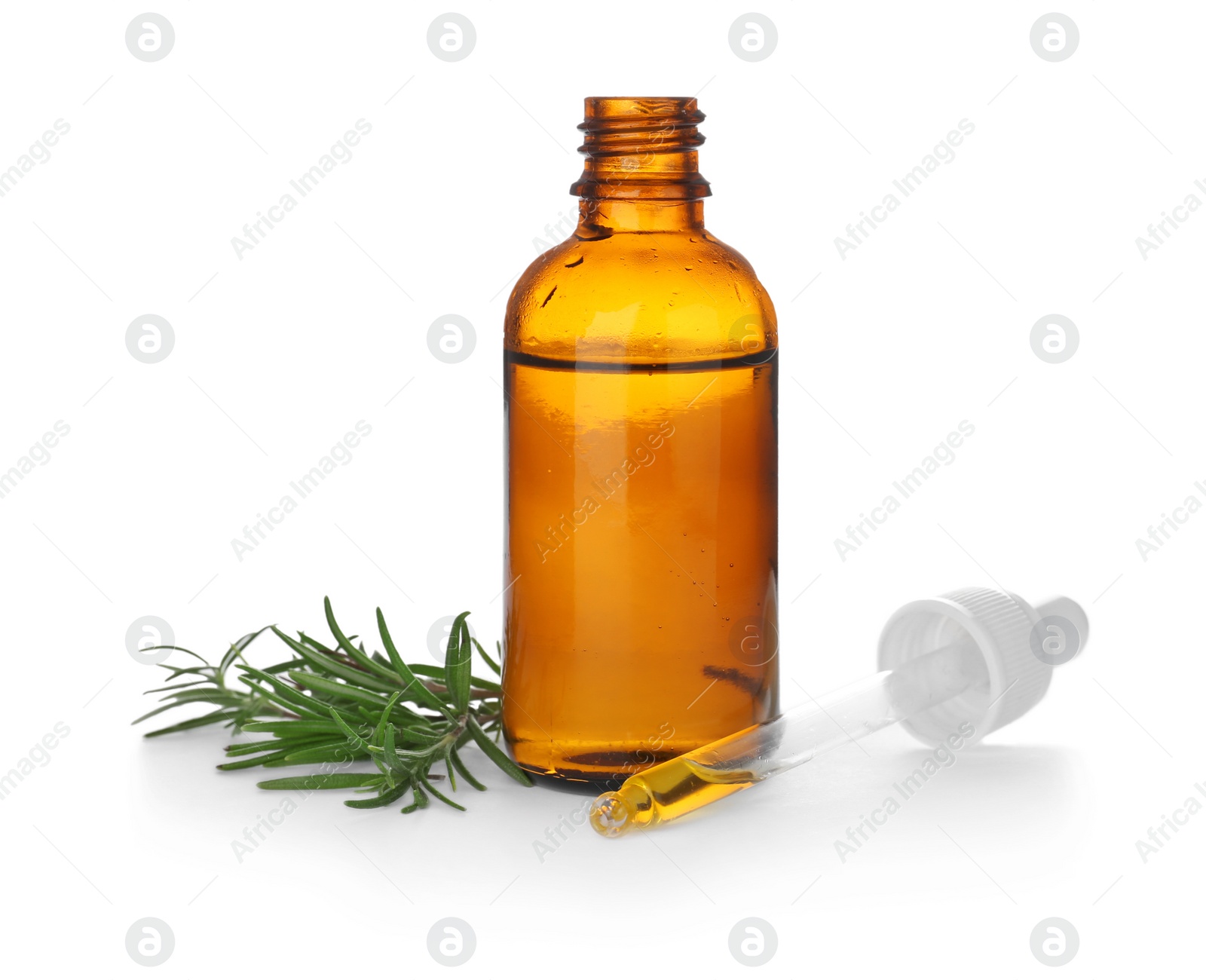 Photo of Bottle with rosemary oil on white background