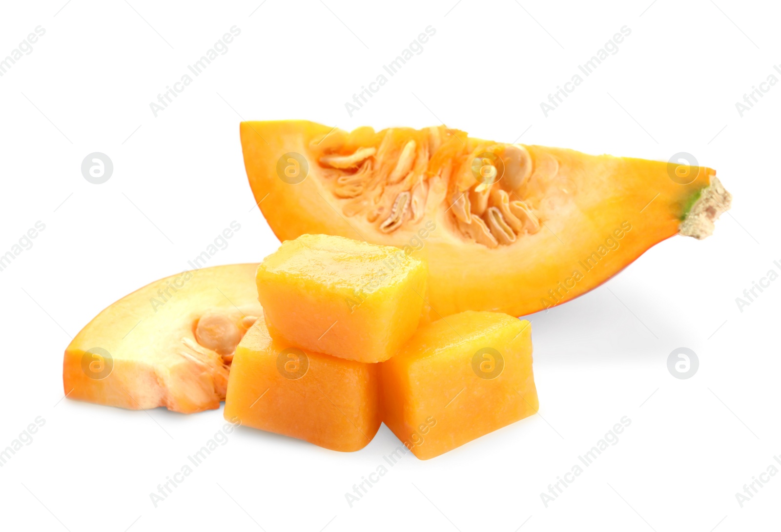 Photo of Frozen pumpkin puree cubes and fresh pumpkin isolated on white