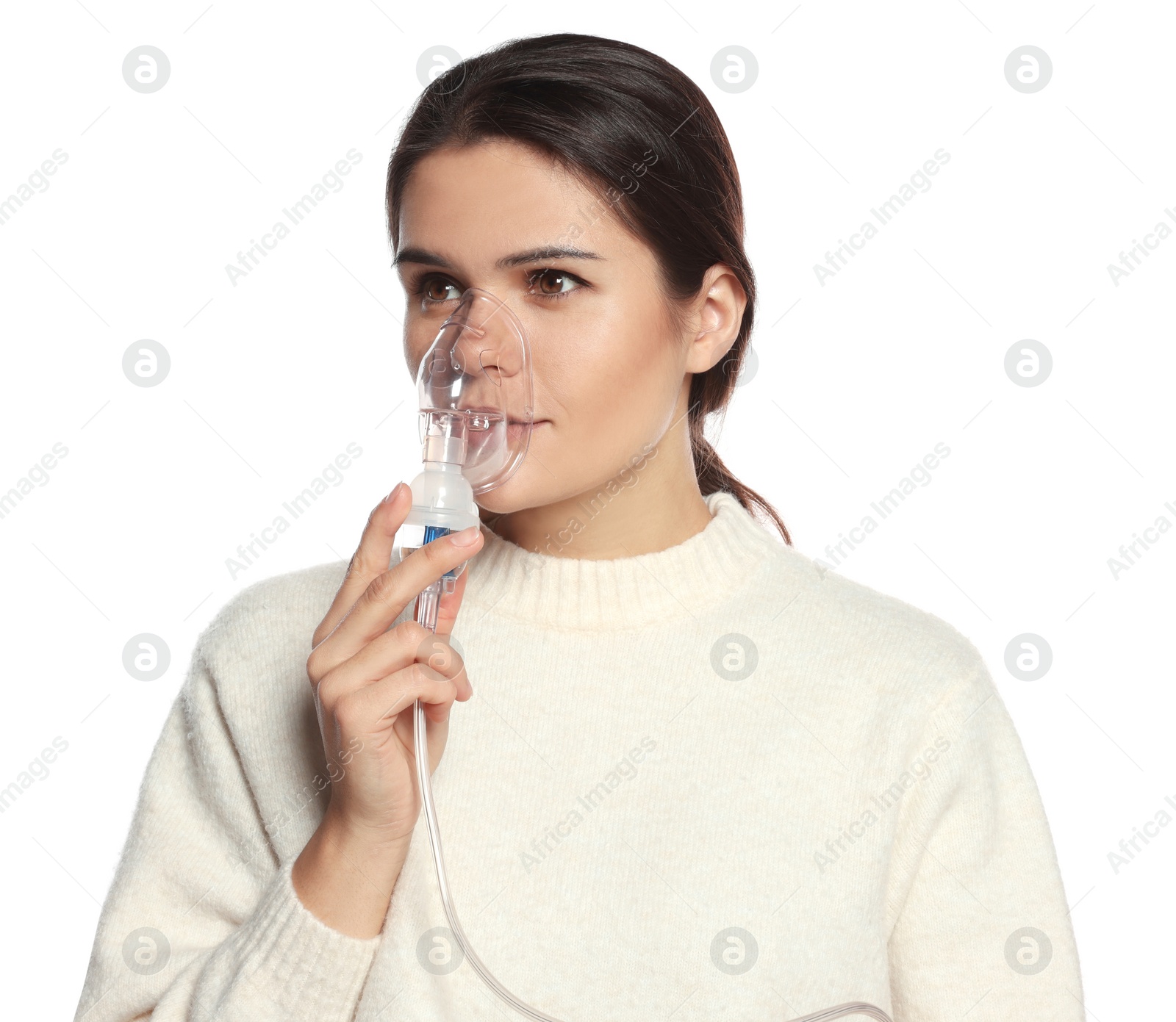 Photo of Young woman using nebulizer on white background