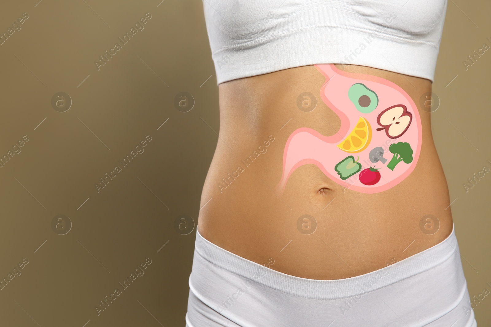 Image of Woman with image of stomach full of food drawn on her belly against beige background, closeup. Healthy eating habits