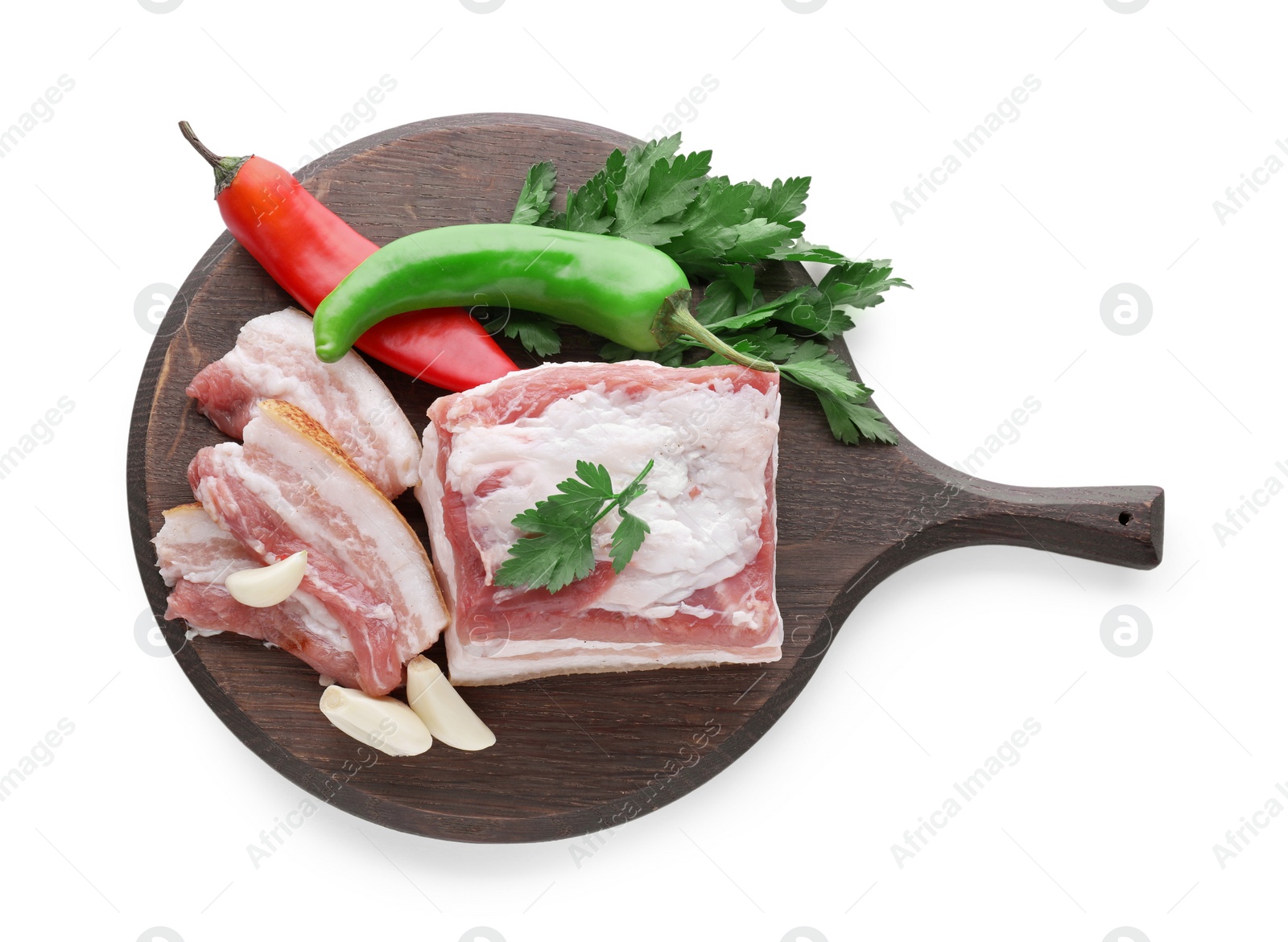 Photo of Pieces of pork fatback and different spices on white background, top view