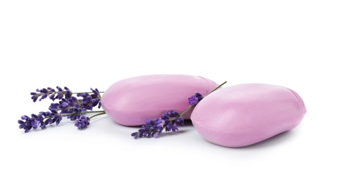 Photo of Soap bars and lavender on white background