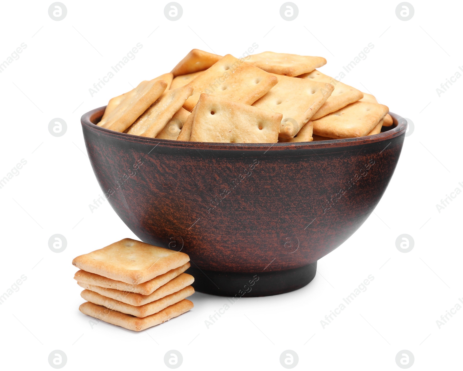 Photo of Tasty crackers in bowl isolated on white