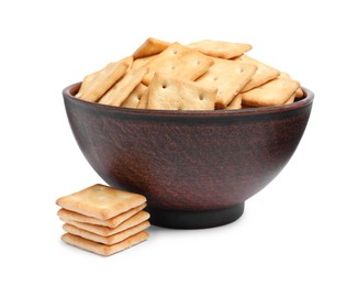 Tasty crackers in bowl isolated on white