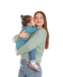 Young mother with little daughter on white background
