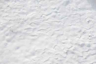 White snow as background, top view. Winter season