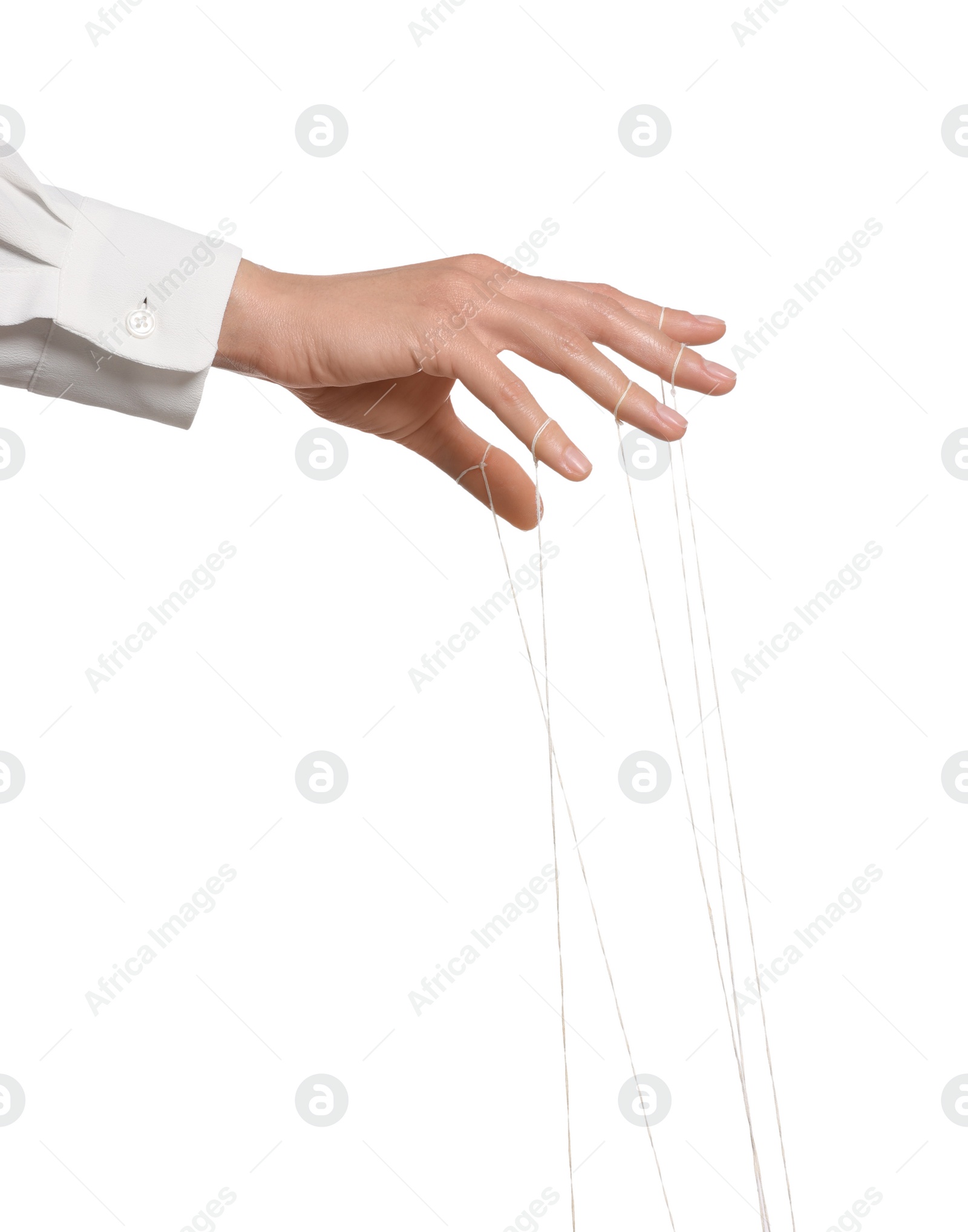 Photo of Woman pulling strings of puppet on white background, closeup