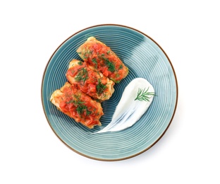 Photo of Plate with delicious cabbage rolls on white background, top view