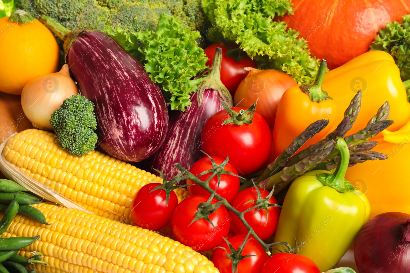 Photo of Different fresh ripe vegetables as background, closeup
