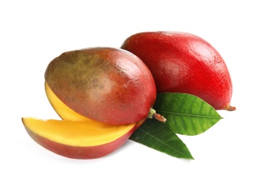 Delicious ripe mangoes on white background. Tropical fruit