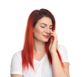 Young woman with bright dyed hair on white background