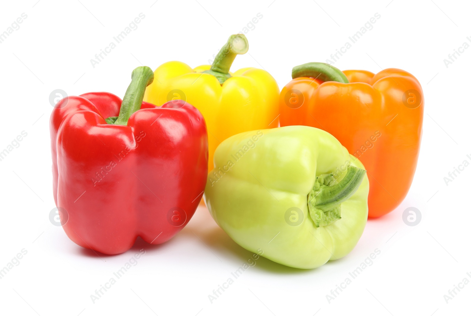 Photo of Fresh ripe bell peppers on white background