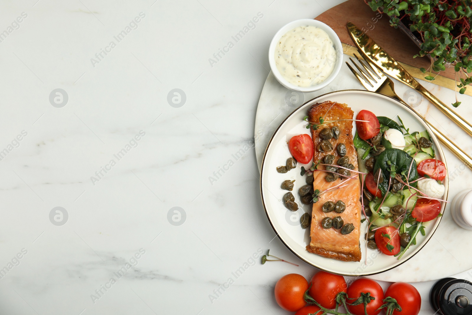 Photo of Delicious salmon with salad and capers on white marble table, flat lay. Space for text