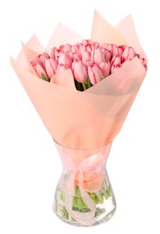 Photo of Bouquet of beautiful pink tulips in vase isolated on white