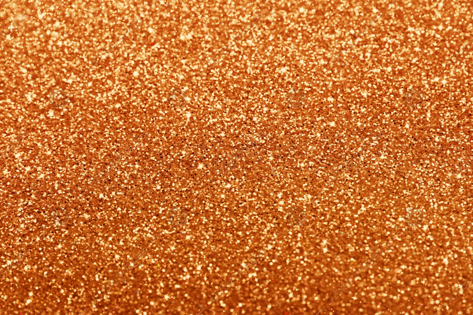 Image of Beautiful shiny orange glitter as background, closeup