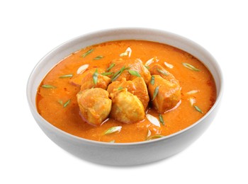 Photo of Bowl of delicious chicken curry on white background