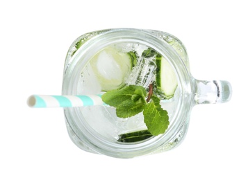 Mason jar with fresh cucumber water on white background, top view