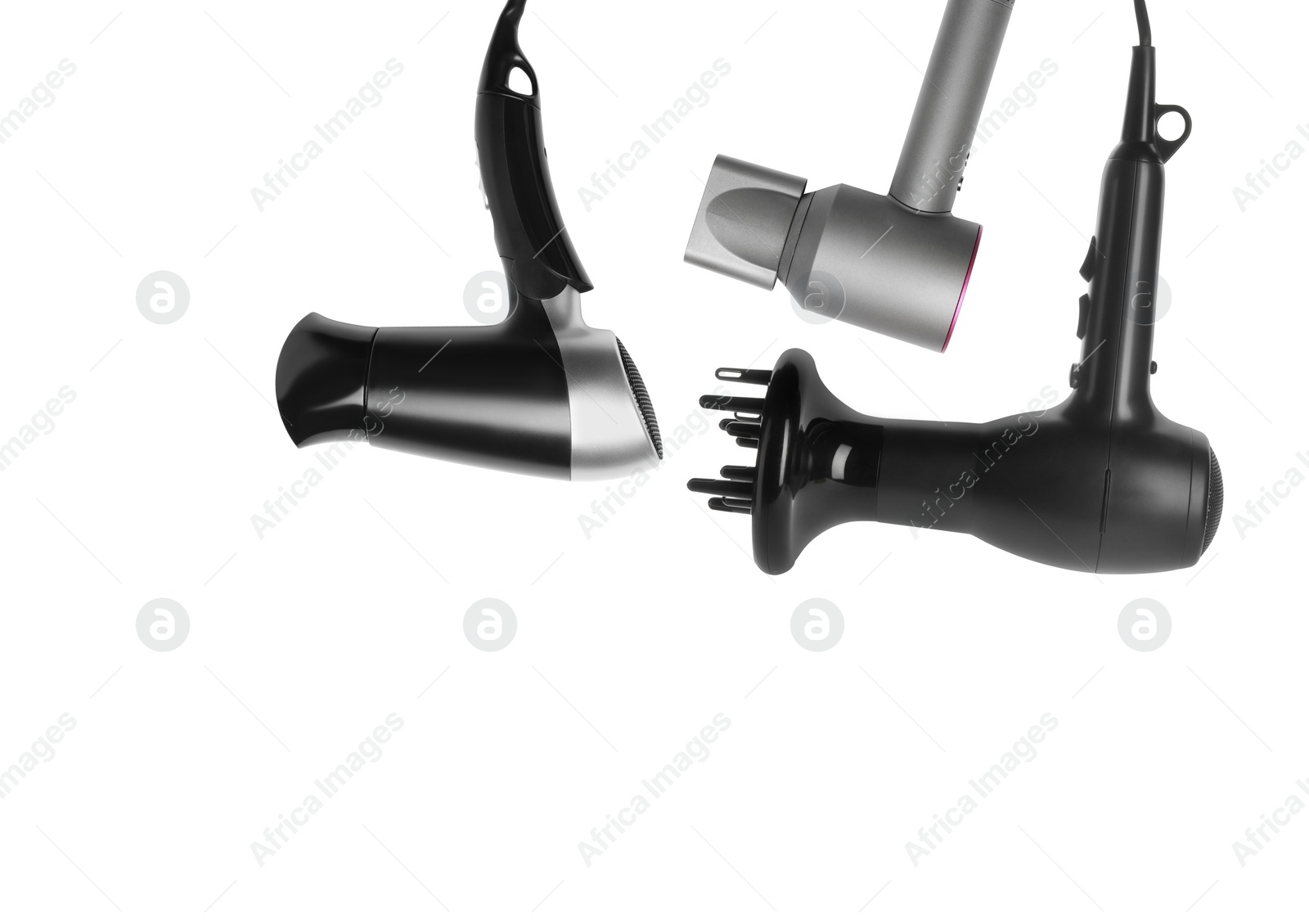 Image of Three different hair dryers on white background