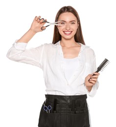 Photo of Portrait of happy hairdresser with professional scissors and brush on white background