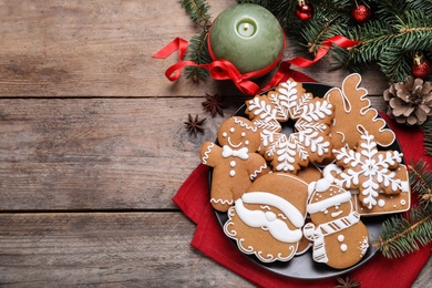 Photo of Delicious Christmas cookies on wooden table, flat lay. Space for text