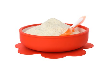 Photo of Dry healthy baby food in bowl on white background