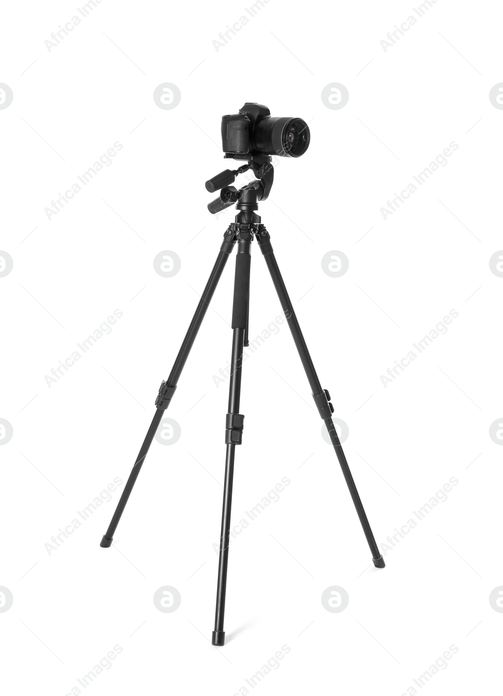 Photo of Modern tripod with camera isolated on white