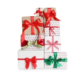 Photo of Beautifully wrapped gift boxes on white background