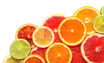 Photo of Slices of fresh citrus fruits on white background, top view