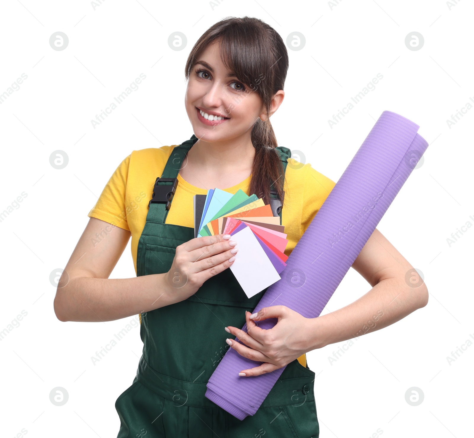 Photo of Beautiful woman with wallpaper roll and color palette on white background