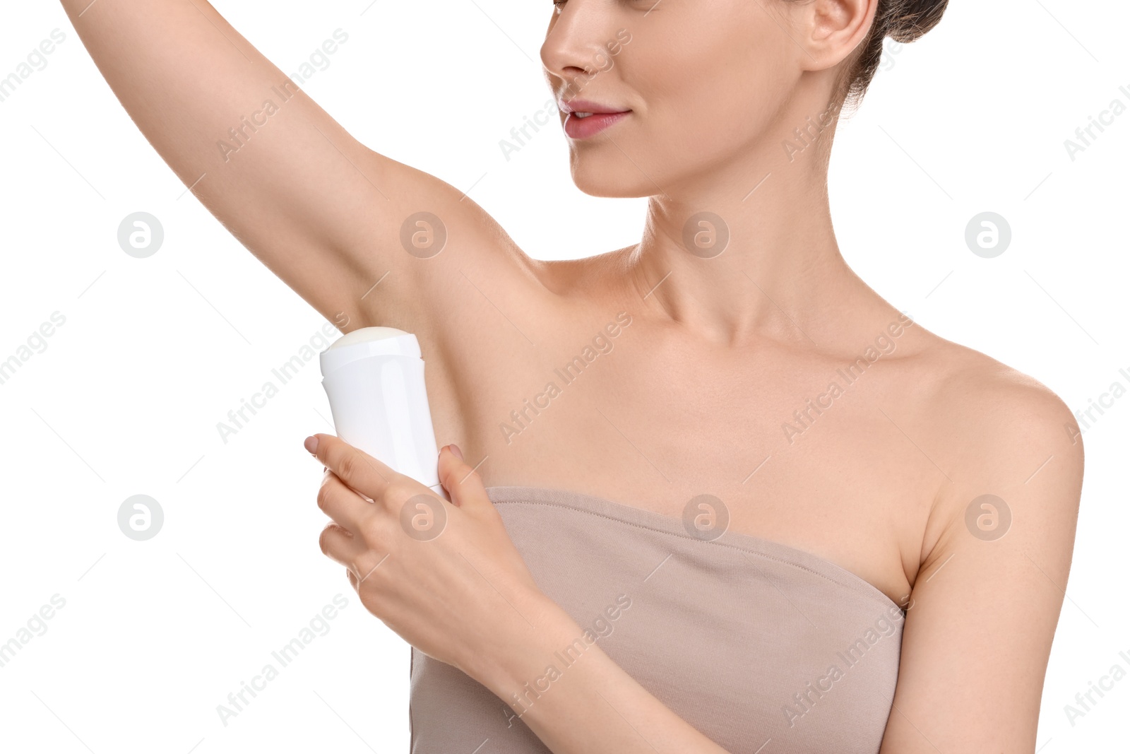 Photo of Woman applying deodorant on white background, closeup