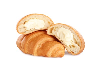 Photo of Delicious croissants with cream on white background