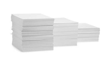 Photo of Stacks of paper sheets on white background