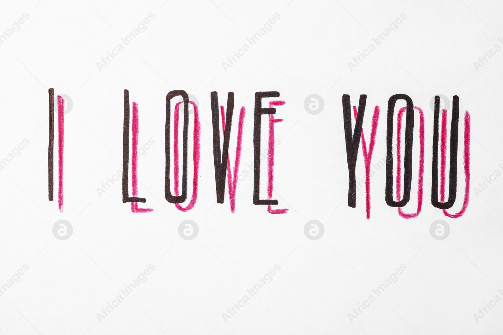 Photo of Handwritten text I Love You on white background