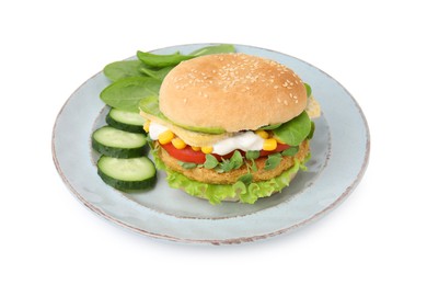 Photo of Tasty vegan burger with vegetables, patty and microgreens isolated on white