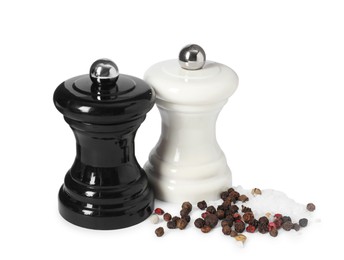 Photo of Two shakers with pepper and salt isolated on white