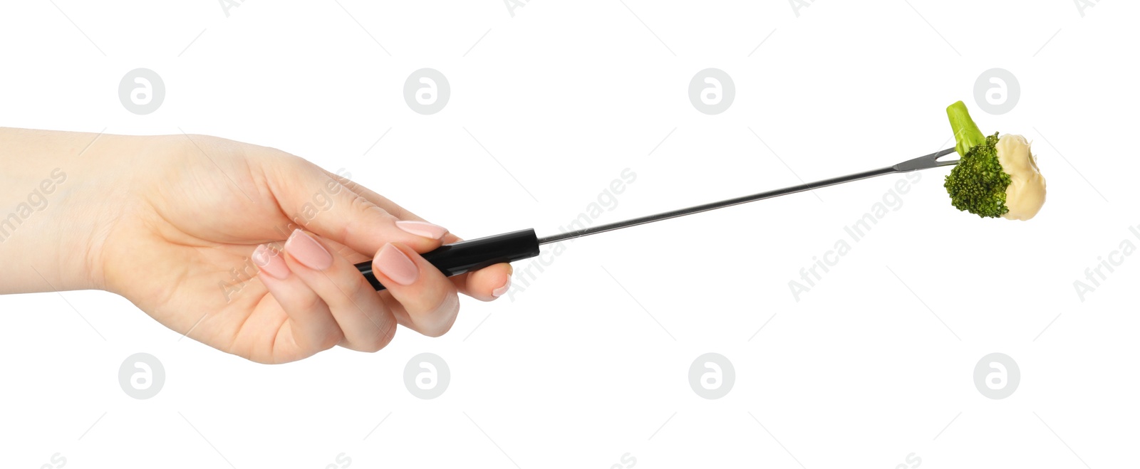 Photo of Tasty fondue. Woman holding fork with broccoli and melted cheese on white background, closeup