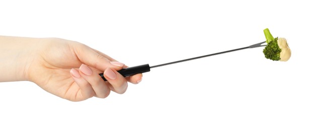 Photo of Tasty fondue. Woman holding fork with broccoli and melted cheese on white background, closeup