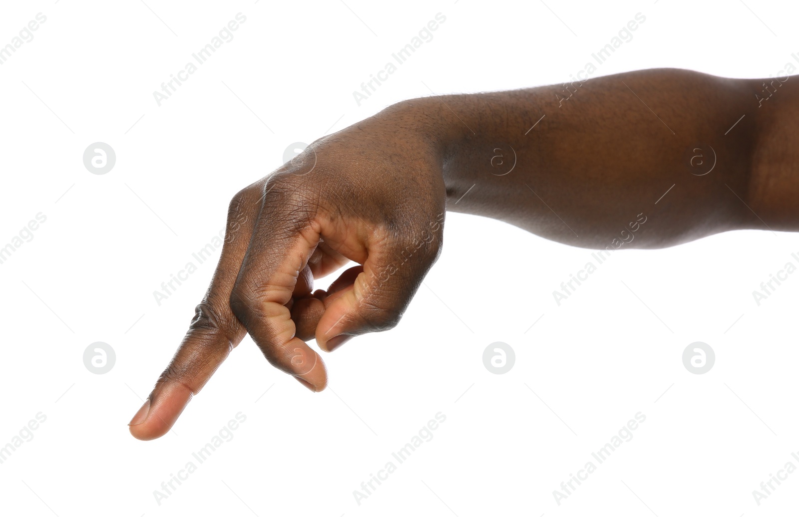 Photo of African-American man pointing at something on white background, closeup