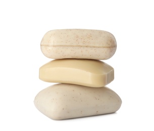 Photo of Stack of different soap bars on white background