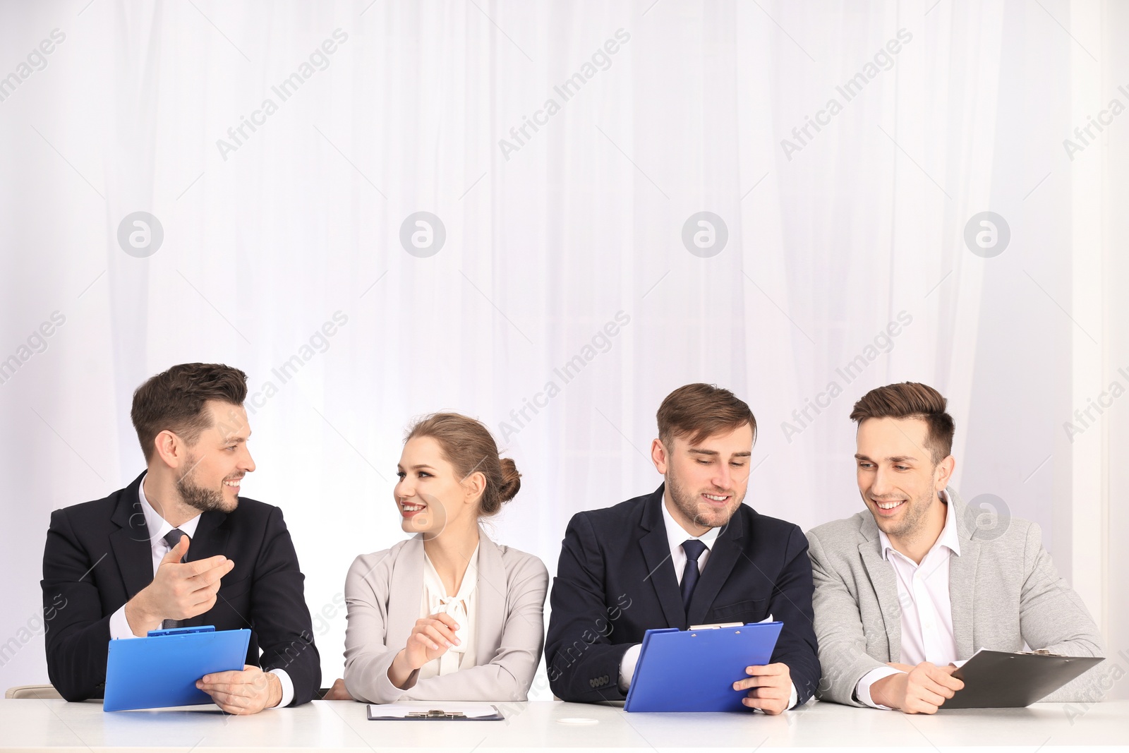 Photo of Human resources commission ready to conduct job interview, indoors