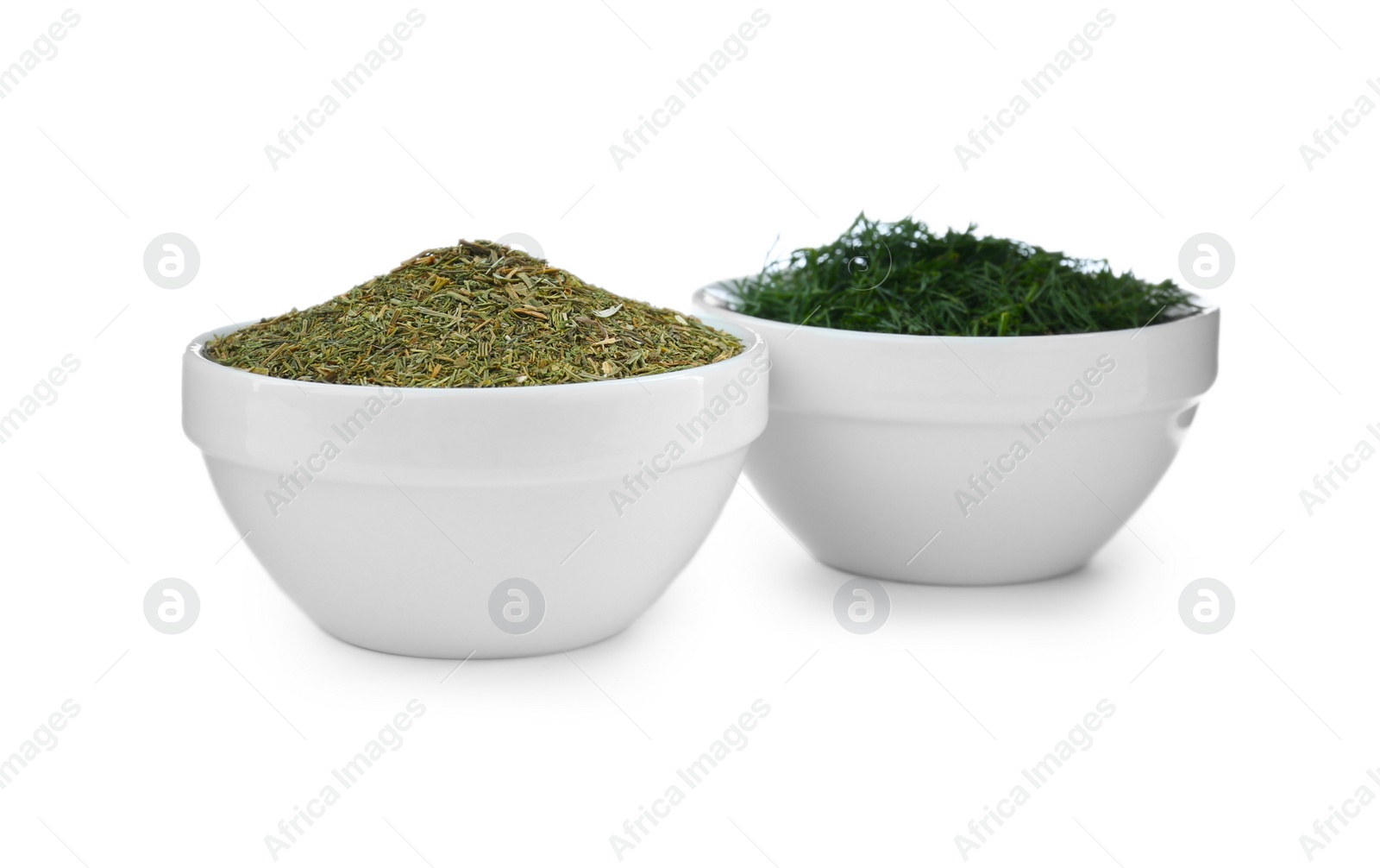 Photo of Bowls with aromatic dry and fresh dill on white background