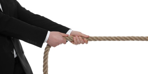 Photo of Dispute concept. Man pulling rope on white background, closeup