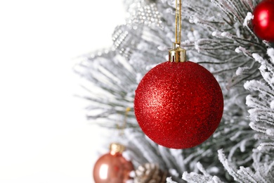 Photo of Beautiful Christmas tree with festive decor on white background, closeup