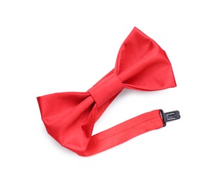 Photo of Stylish red bow tie on white background, top view