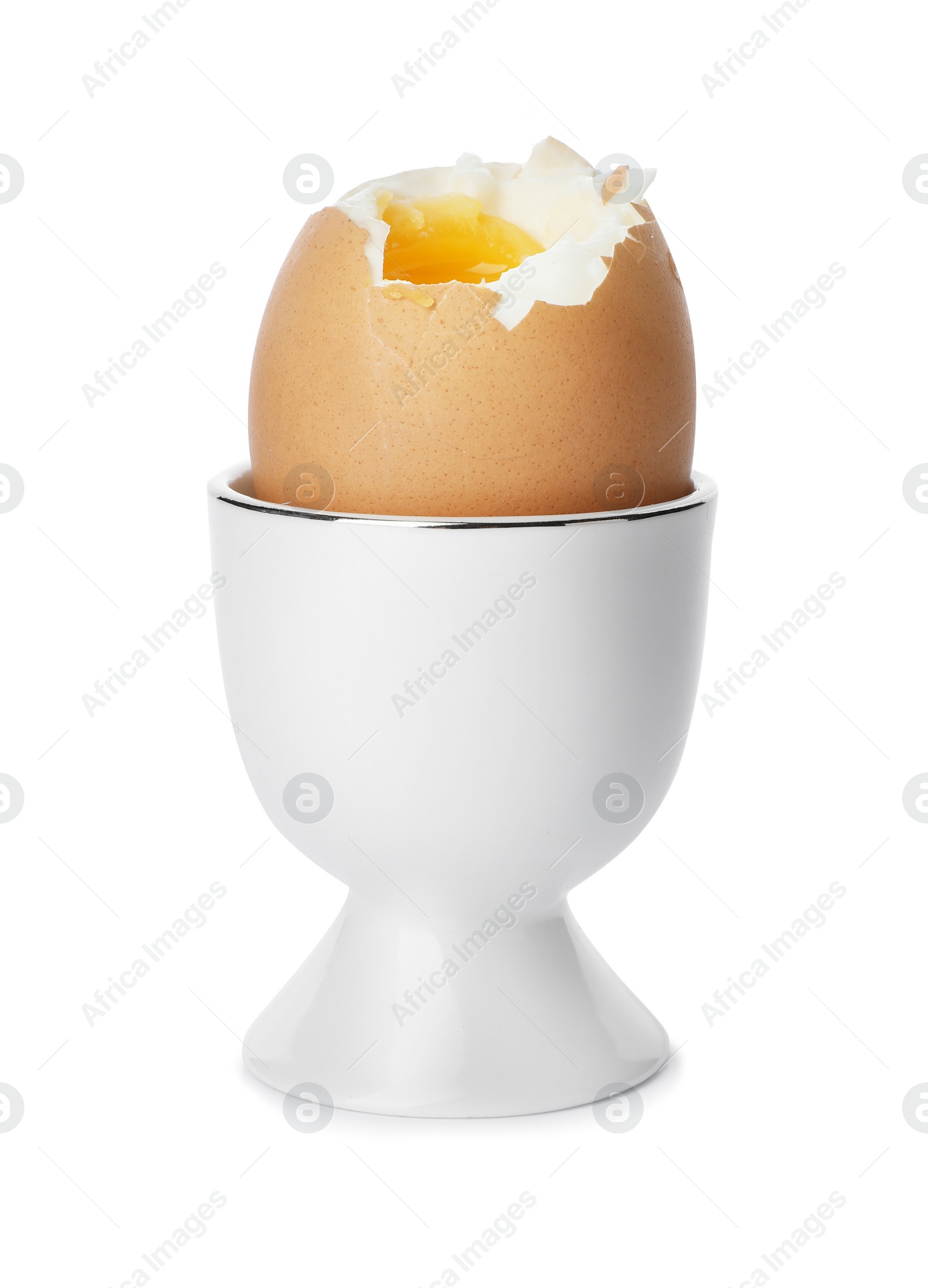 Photo of Holder with soft boiled egg on white background