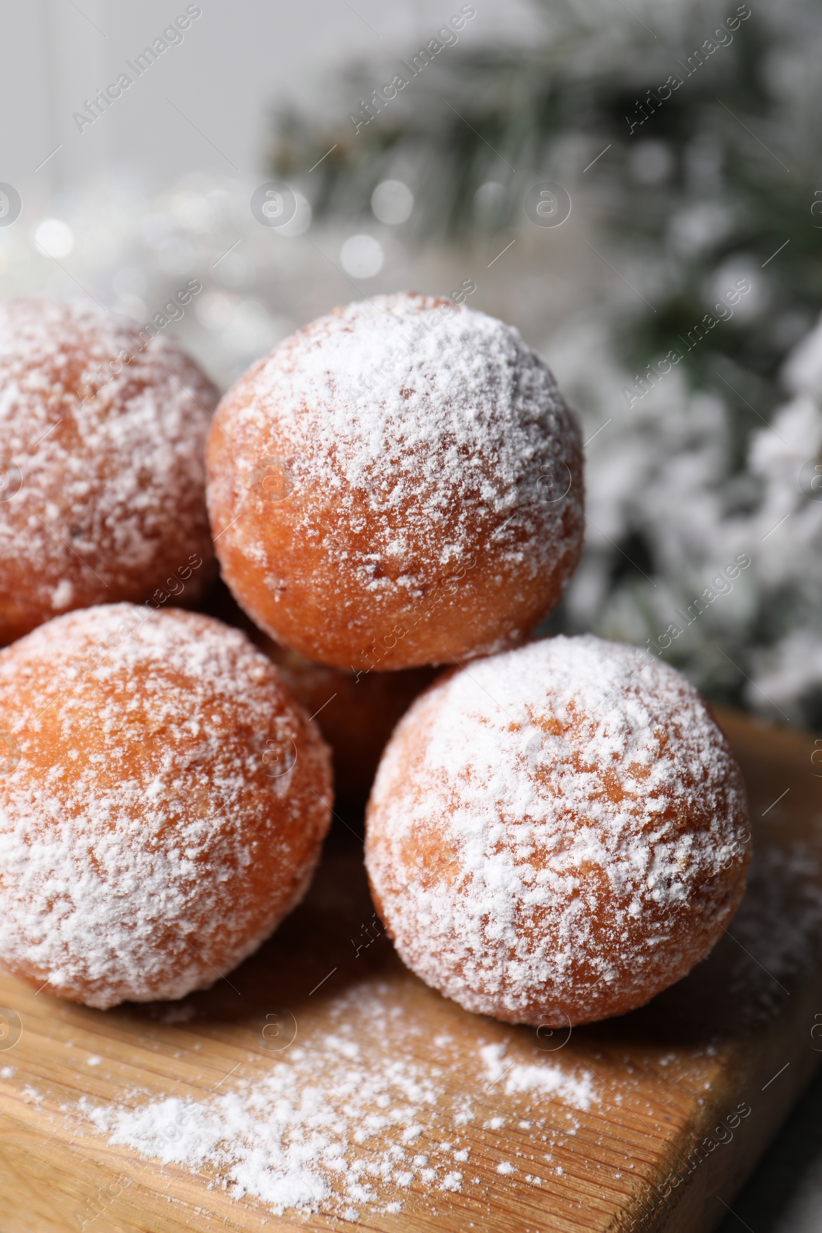 Photo of Delicious sweet buns on table against blurred background, closeup