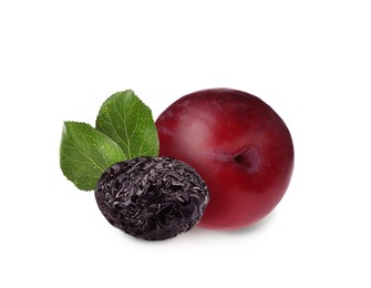 Image of Delicious fresh ripe plum and sweet dried prune on white background 