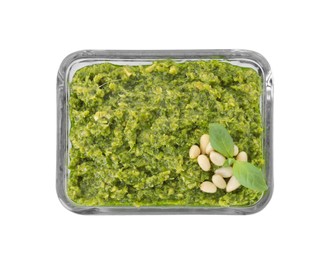 Delicious pesto sauce in bowl isolated on white, top view