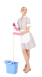 Photo of Young chambermaid with mop and bucket on white background