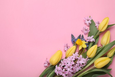 Beautiful bouquet with different flowers on pink background, flat lay. Space for text